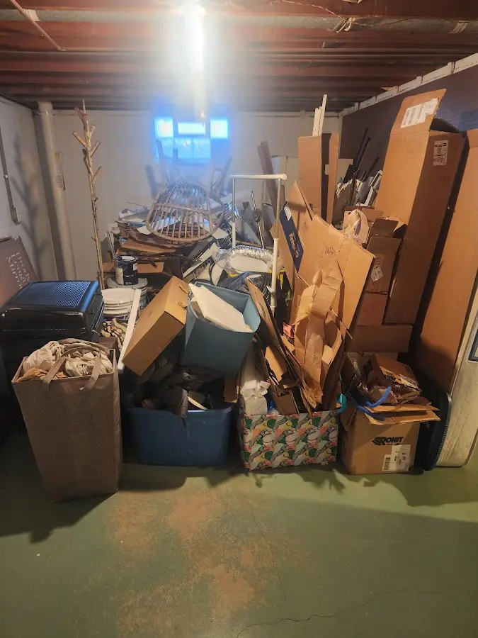 Roll-off dumpster container at job site for Construction Dumpster Rental in Williams